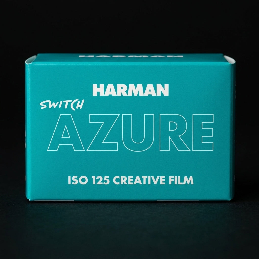 Teal Harman Switch Azure ISO 125 35mm film box on a black background