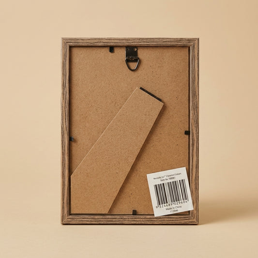 Back of the Necessity 5x7 frame showing kickstand, hanging hook and label