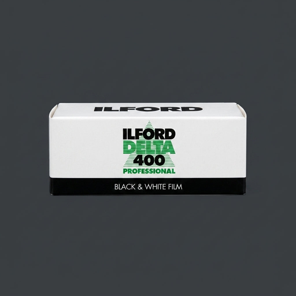 Ilford Delta 400 Professional 120 film box standing upright on grey background