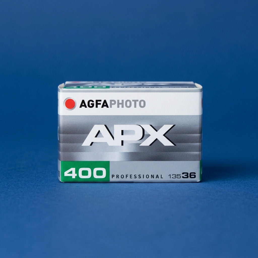 AgfaPhoto APX 400 Professional 135-36 film box on a dark blue background