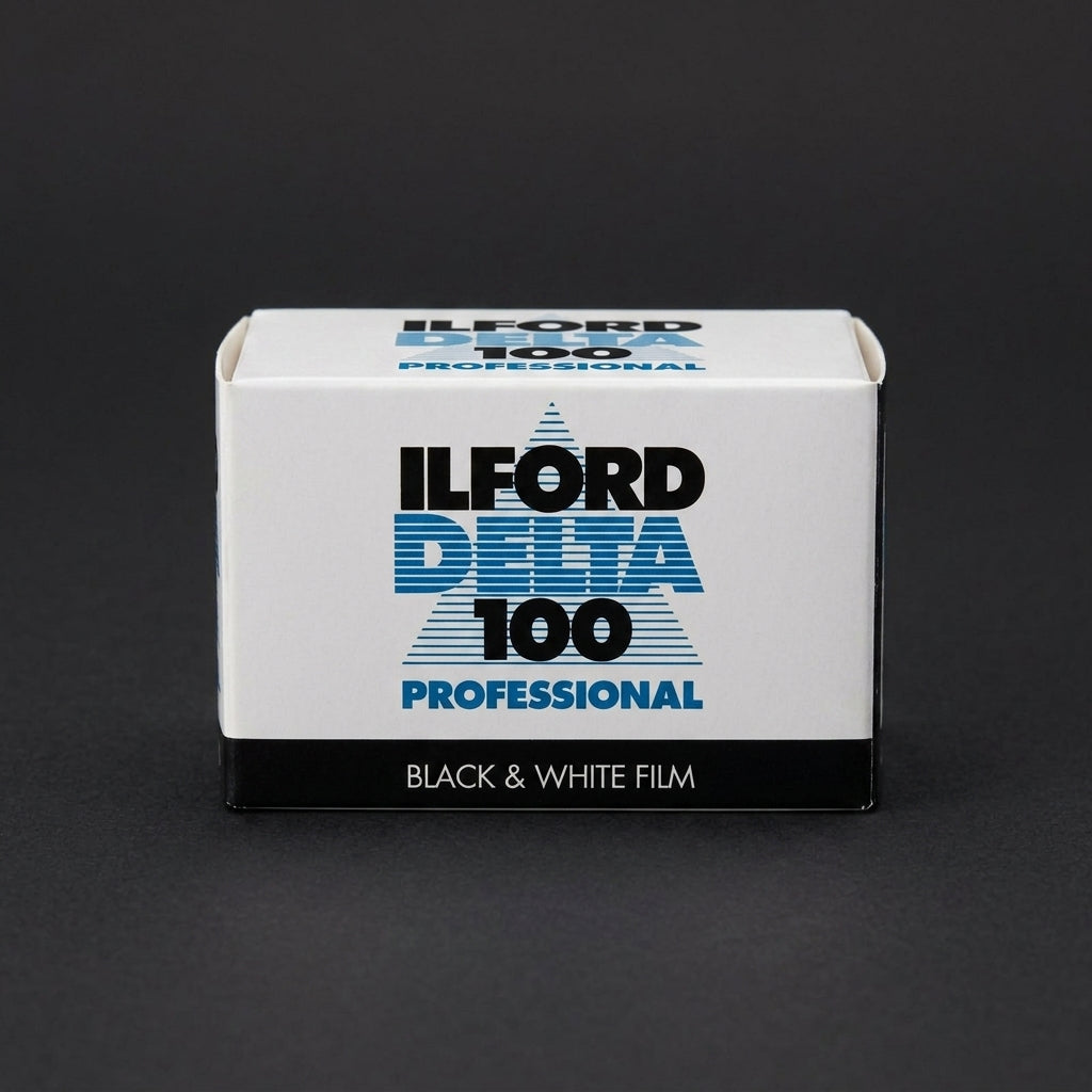 Ilford Delta 100 Professional 35mm film box, front view on dark background