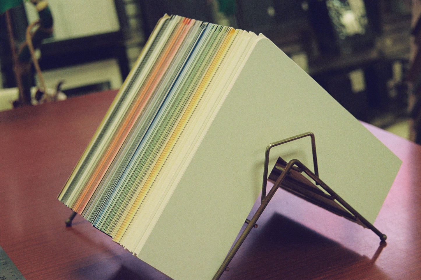 Color swatch book with metal stand on a blurred background