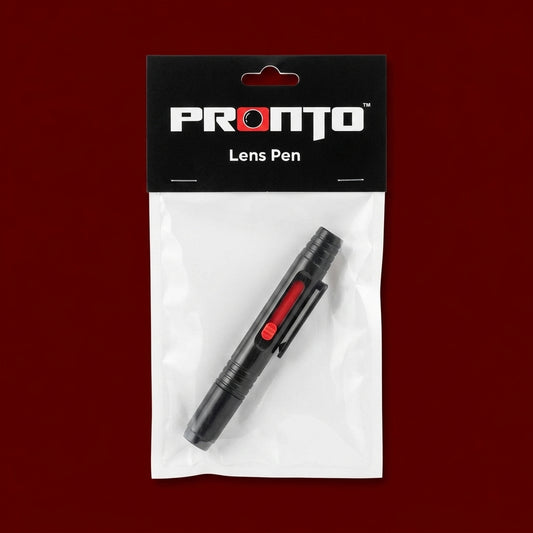 Pronto Lens Pen, black with red slider, in sealed packet on dark red background
