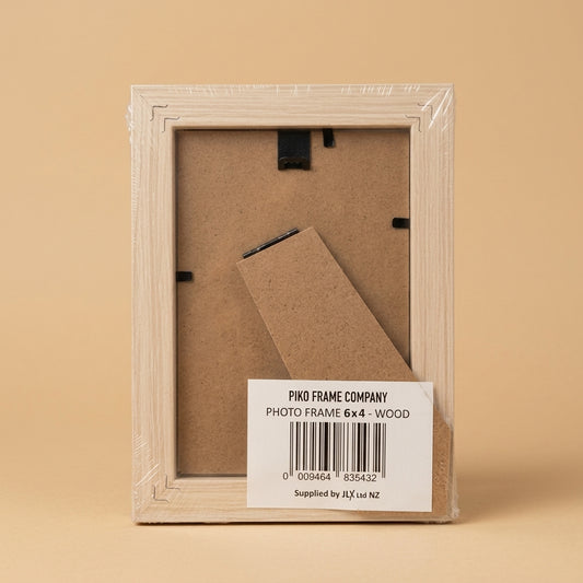Back of PIKO 6x4 wood frame in wrapping, showing stand and barcode label