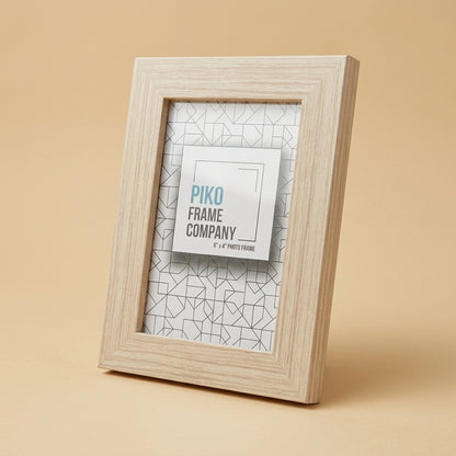 PIKO 6x4 wood frame at an angle, showing depth of the pale timber moulding