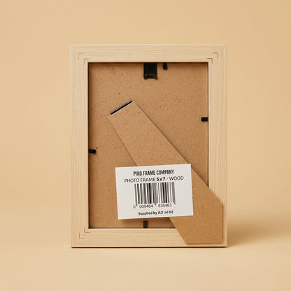 Back of the PIKO 5x7 wood frame showing stand, clips and barcode label