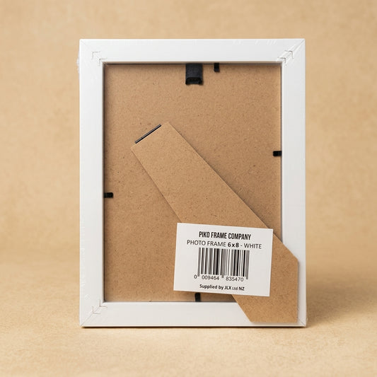 Back of PIKO 6x8 white frame in wrapping, with kickstand and barcode label