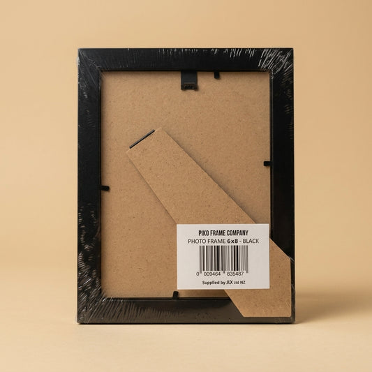 Back of the wrapped PIKO 6x8 black frame showing stand and barcode label