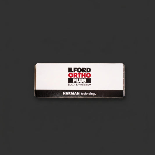 Ilford Ortho Plus 80 120 film box lying flat on black background