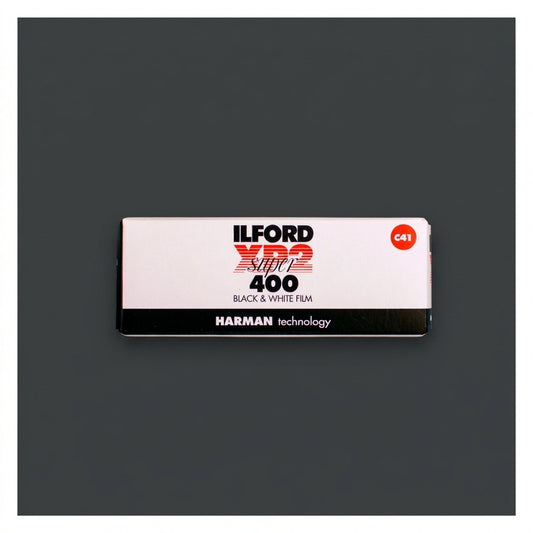 Ilford XP2 Super 400 120 film box lying flat on grey background