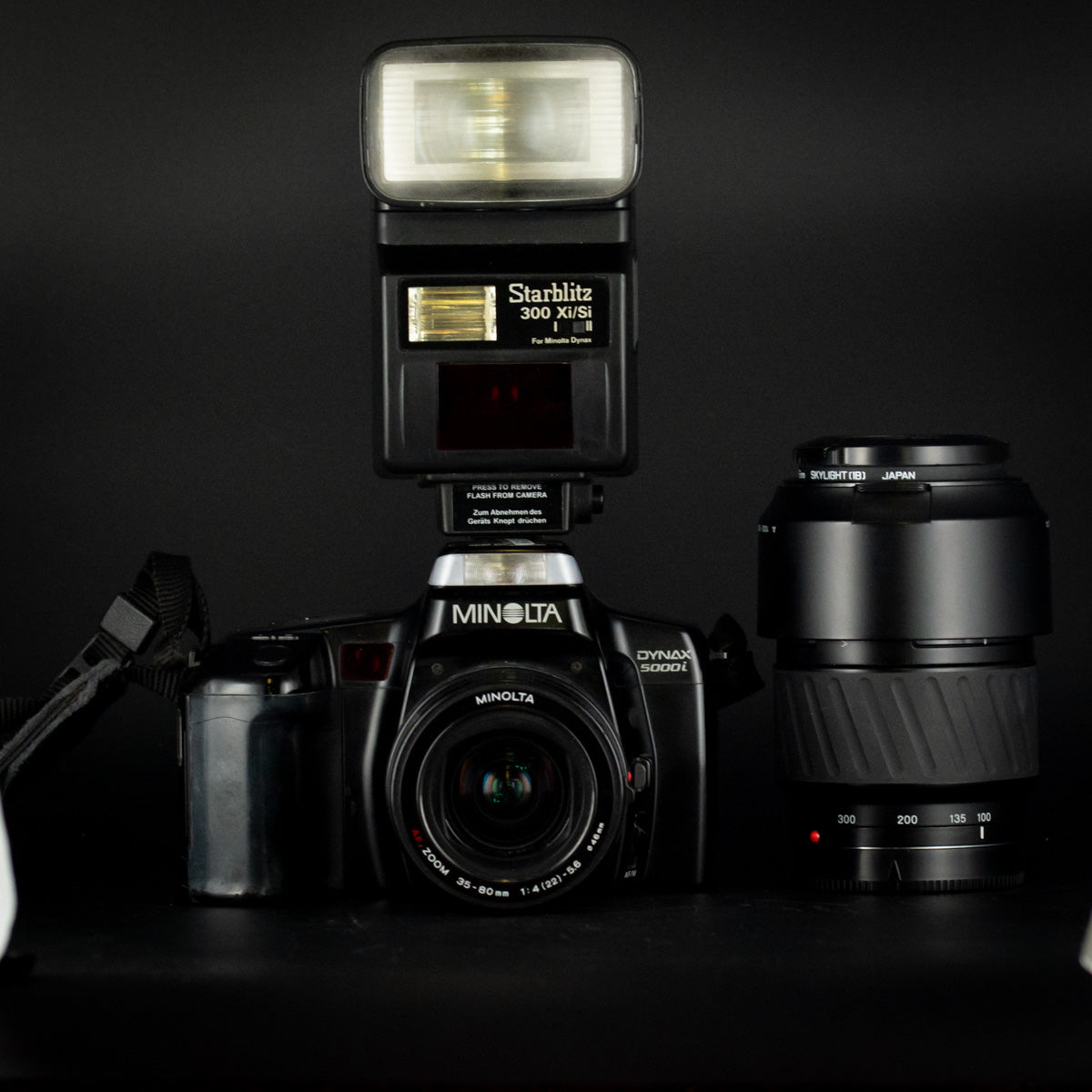 Minolta Dynax 5000i with 35-80mm & 100-300mm Lenses + Starblitz Flash
