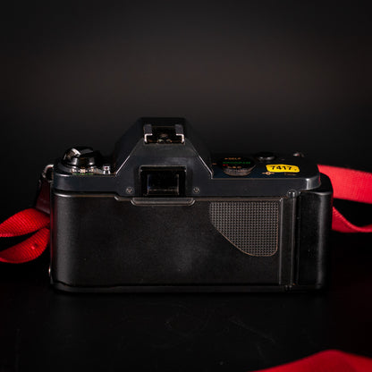 Canon T50 35mm SLR Camera with 24mm f/2.8 Lens