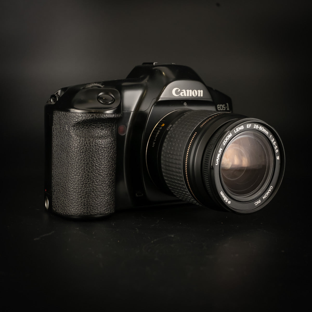Canon EOS-1 with 28-80mm lens seen from the other side, lens facing right