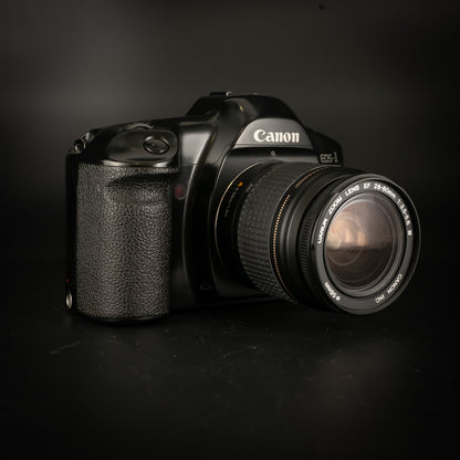 Canon EOS-1 with 28-80mm lens seen from the other side, lens facing right