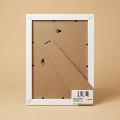 Back of the A4 frame showing white edges, MDF backing board, strut and barcode label