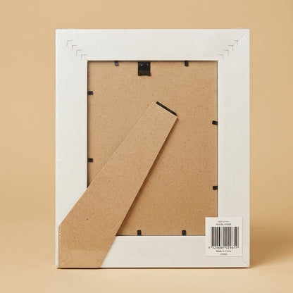 Back of the 6x8 frame in plastic wrap, showing backing board, easel stand and label