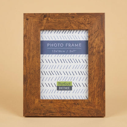 Westminister 5x7 frame in rustic brown wood, standing upright with paper insert