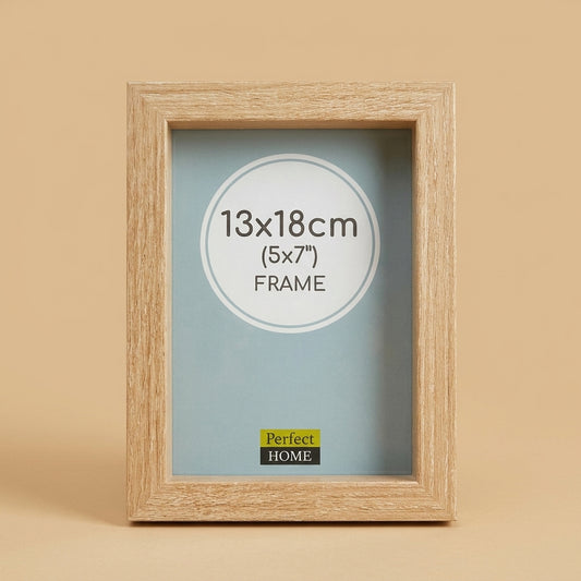 Geneva 5x7 frame in light oak, standing upright with 13x18cm insert card, tan background