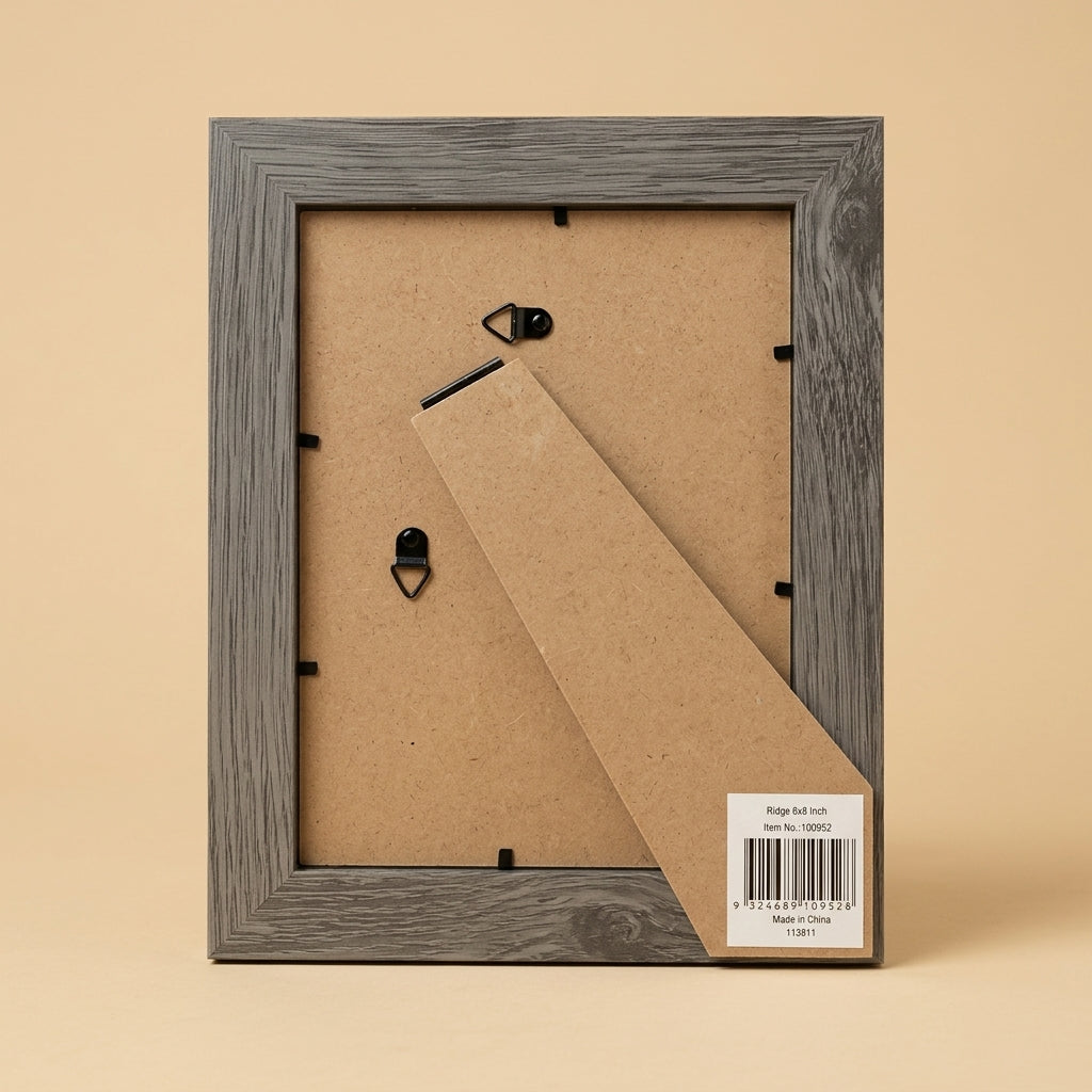 Back of grey Ridge 6x8 frame showing backing board, hooks, easel stand and label