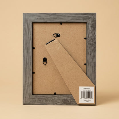 Back of grey Ridge 6x8 frame showing backing board, hooks, easel stand and label