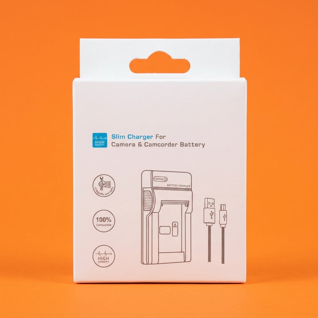White boxed slim charger for camera batteries, standing on an orange background